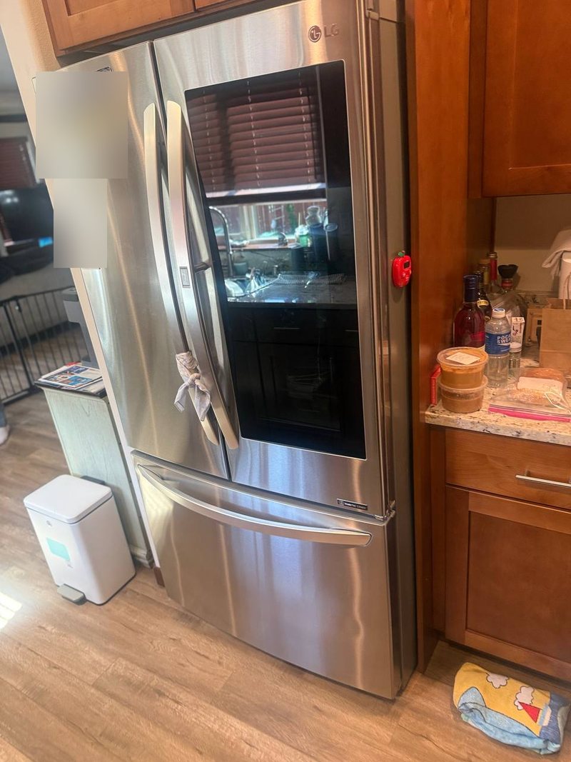 LG InstaView French-door refrigerator in a Gig Harbor kitchen, fresh-food side warm